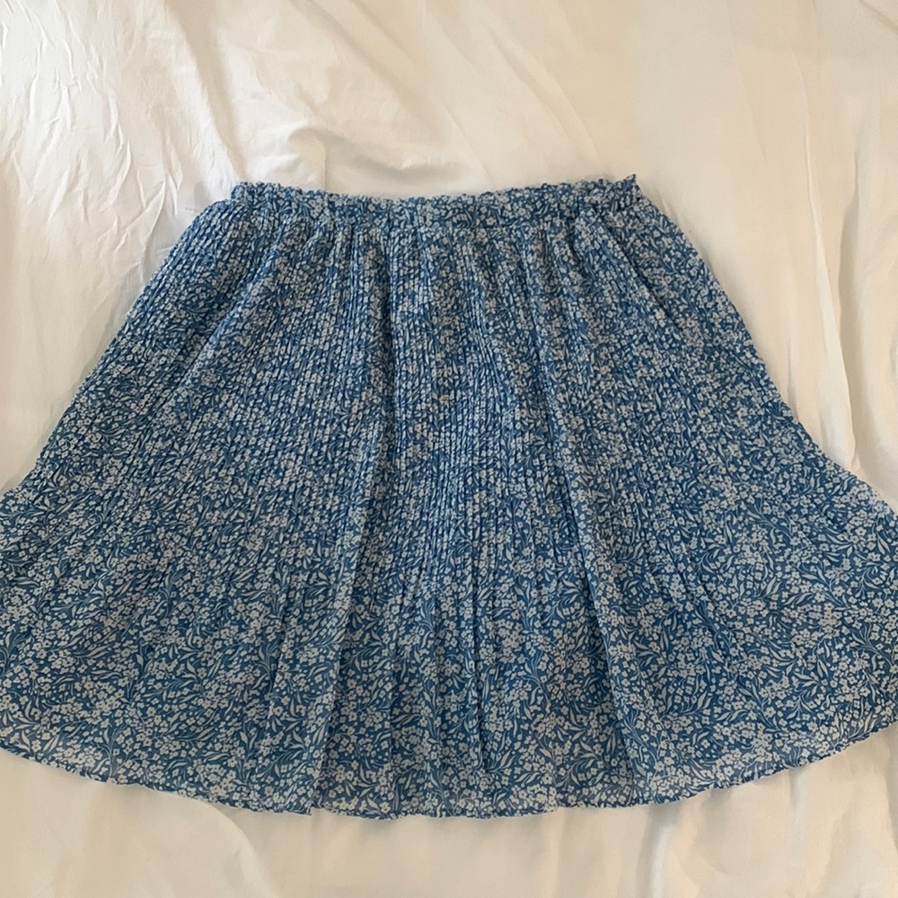 light blue with white flower design skirt